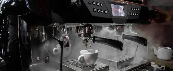 Bæredygtighed og effekt i kaffeindustrien: Hvordan espressomaskiner spiller en rolle i at skabe positiv forandring cover image